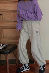 Süße graue Jogginghose mit „Little Daisy“